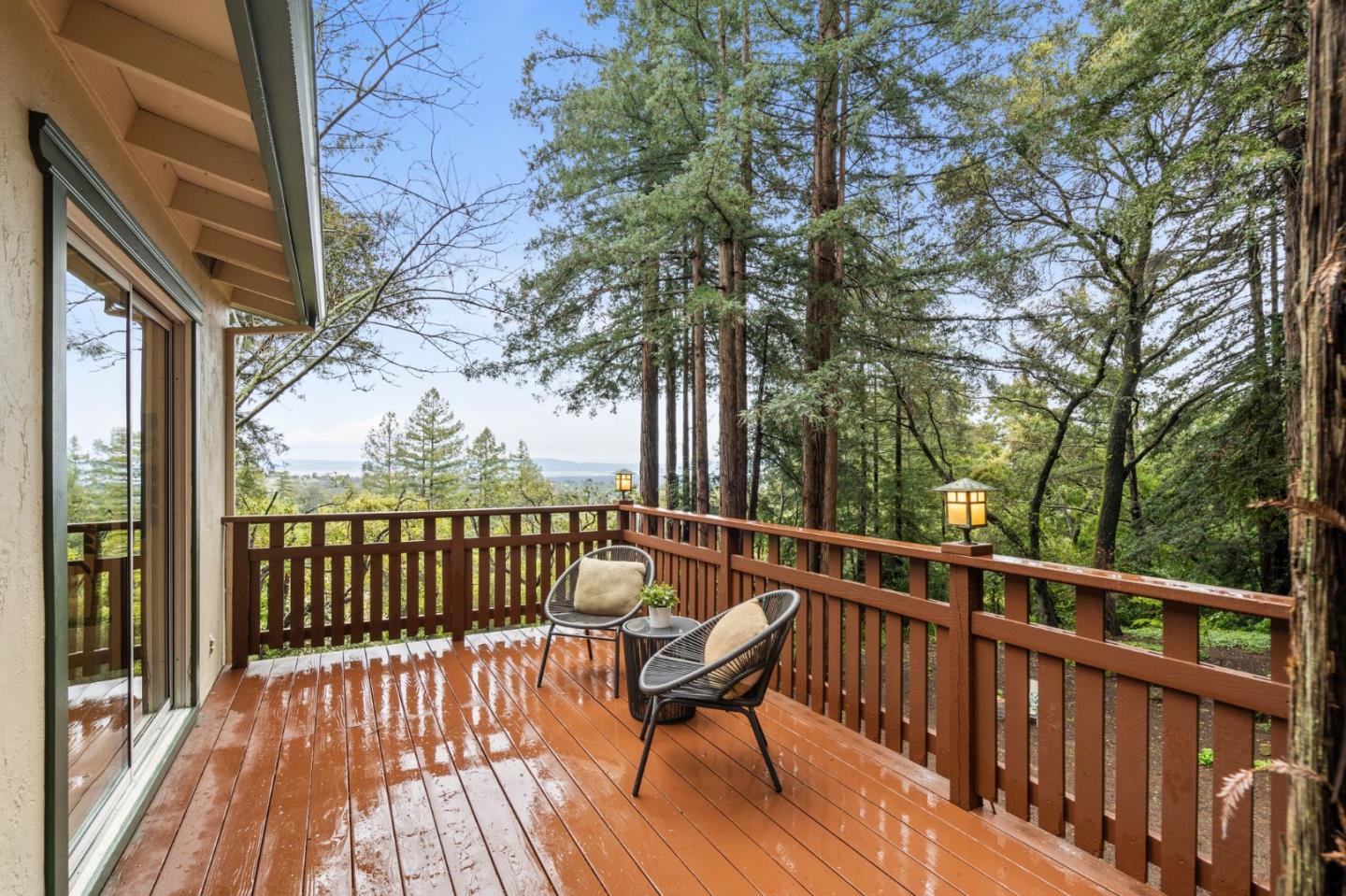 555 Summit Spring Road Woodside, CA 94062 - Photo 56 of 90 a view of a balcony with wooden floor and fence