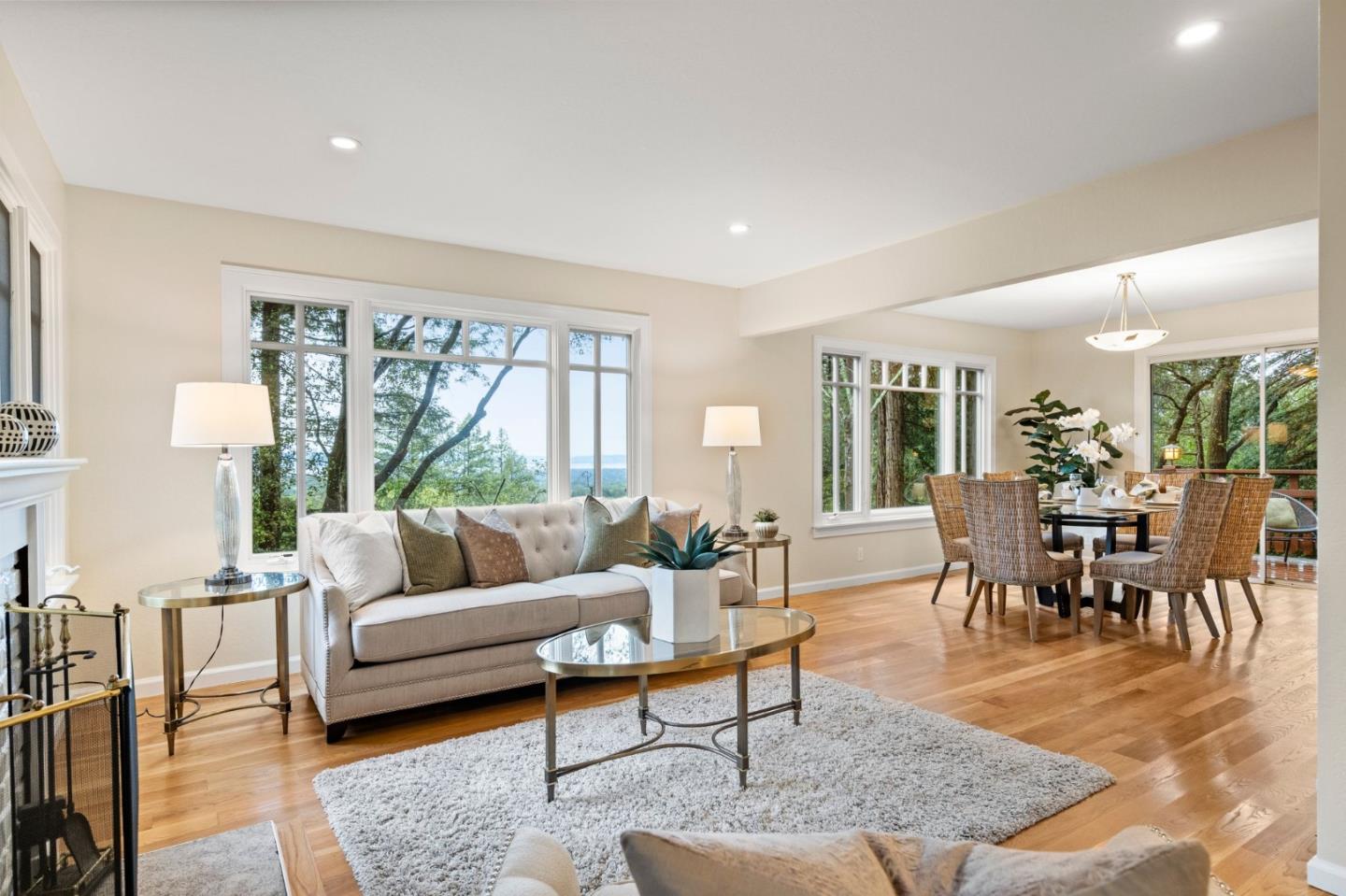 555 Summit Spring Road Woodside, CA 94062 - Photo 10 of 90 a living room with furniture dining table and a large window