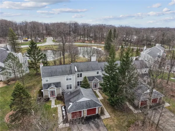 a view of a houses with a yard