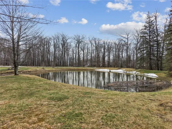 a view of a large lake with a house
