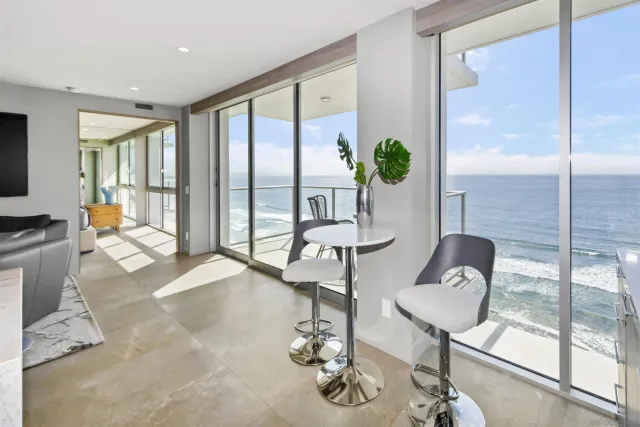 a bathroom with a sink mirror and vanity