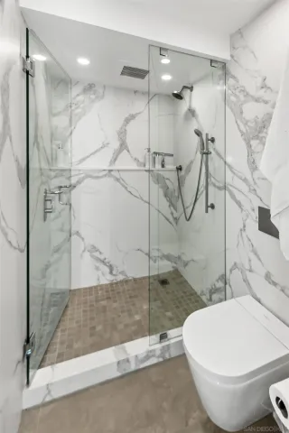 a view of a balcony with chair and table