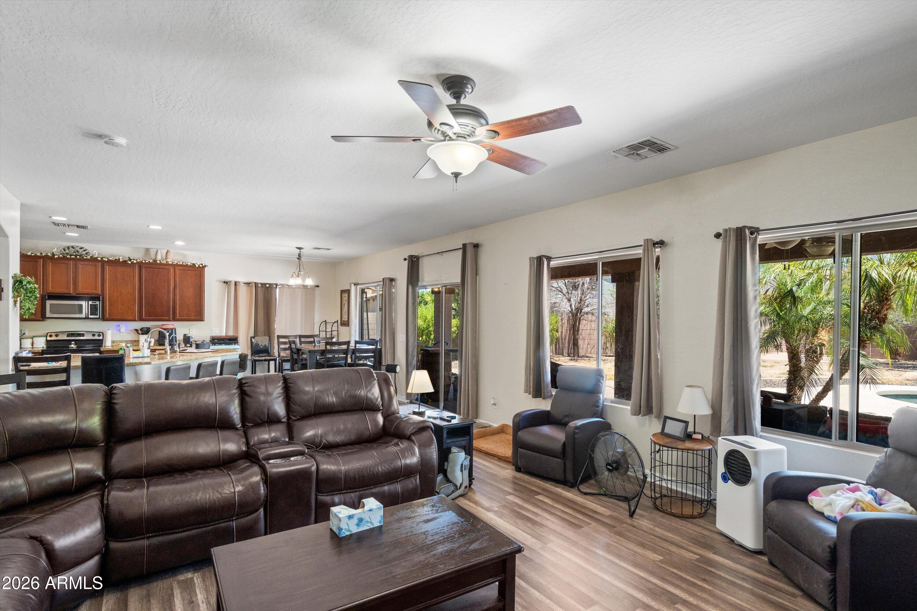 9630 Barley Road Florence, AZ 85132 - Photo 19 of 49 20-Family Room to Kitchen