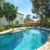 a view of a house with swimming pool