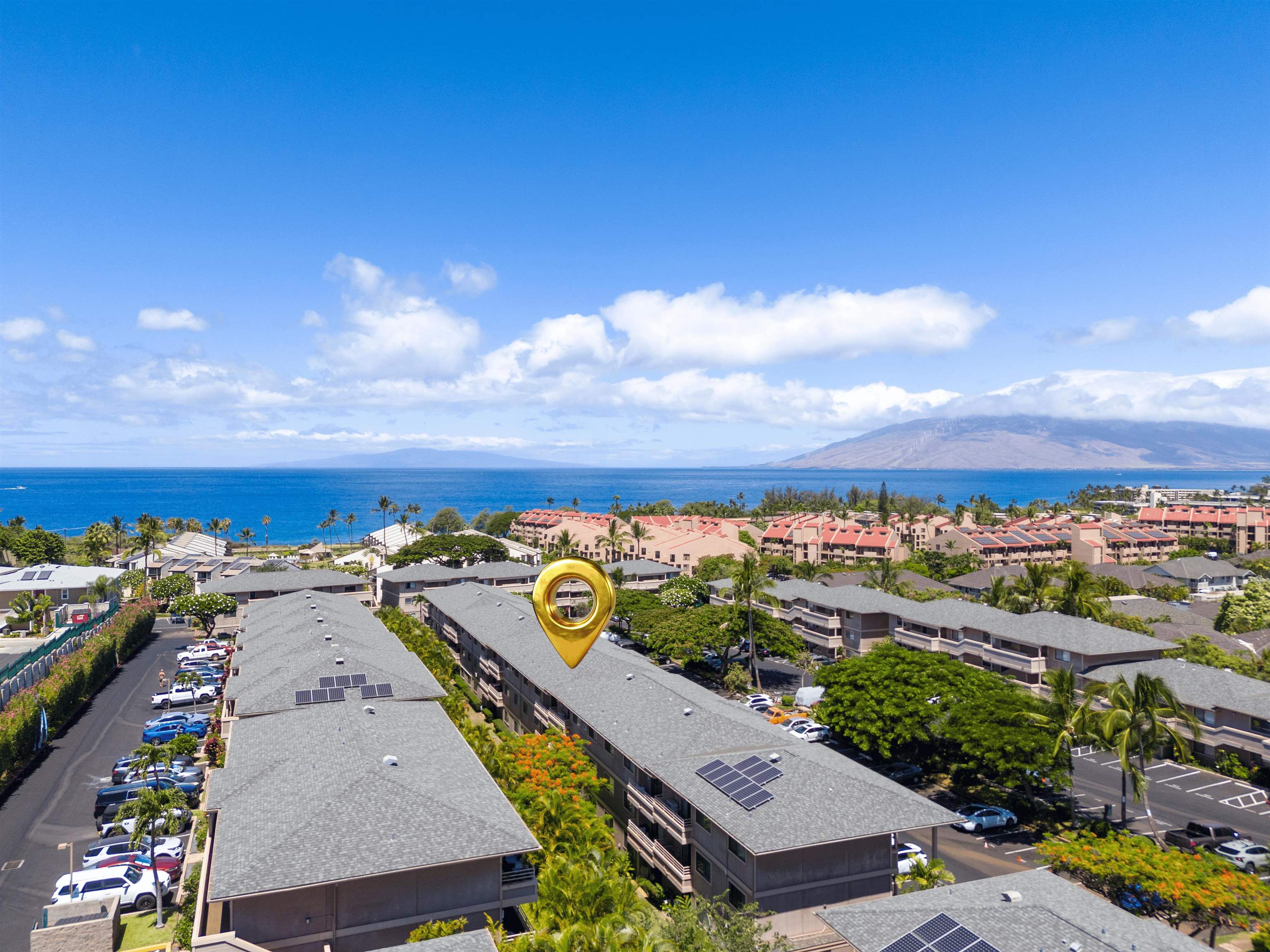 2747 South Kihei Road, Unit E104 Kihei, HI 96753 - Photo 15 of 49 a view of a city with an ocean