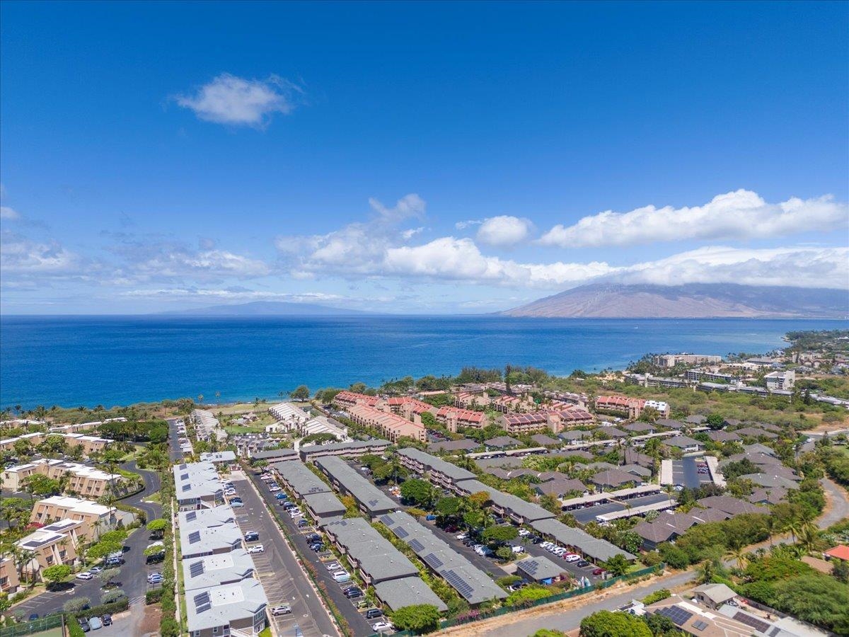 2747 South Kihei Road, Unit E104 Kihei, HI 96753 - Photo 35 of 49 a view of a city with an ocean