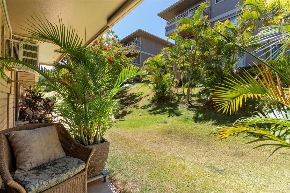 2747 South Kihei Road, Unit E104 Kihei, HI 96753 - Photo 9 of 49 a view of backyard with plants and outdoor seating