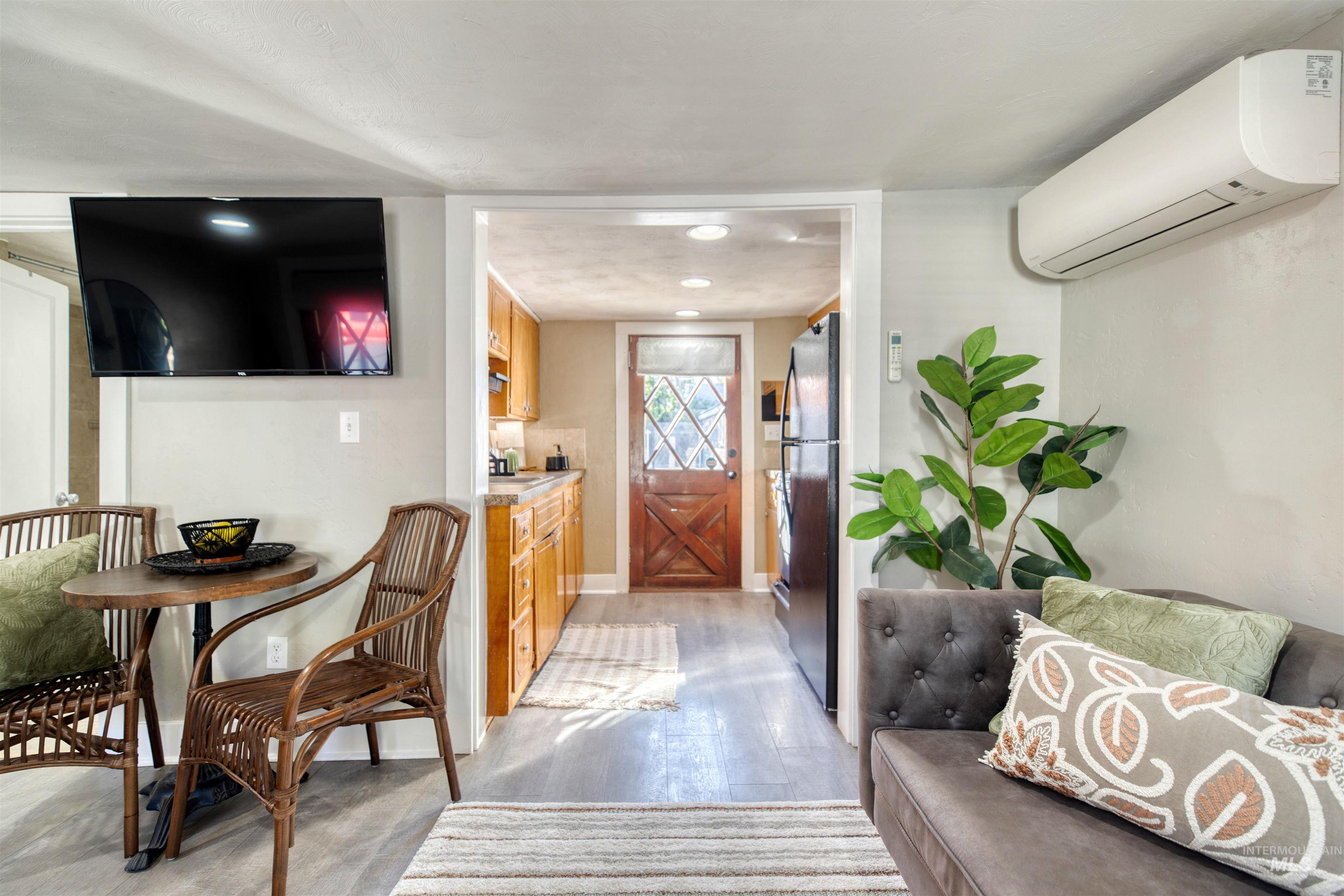 3311 West Hamilton Street Boise, ID 83705 - Photo 15 of 32 Entrance foyer featuring a wall mounted AC and light wood finished floors