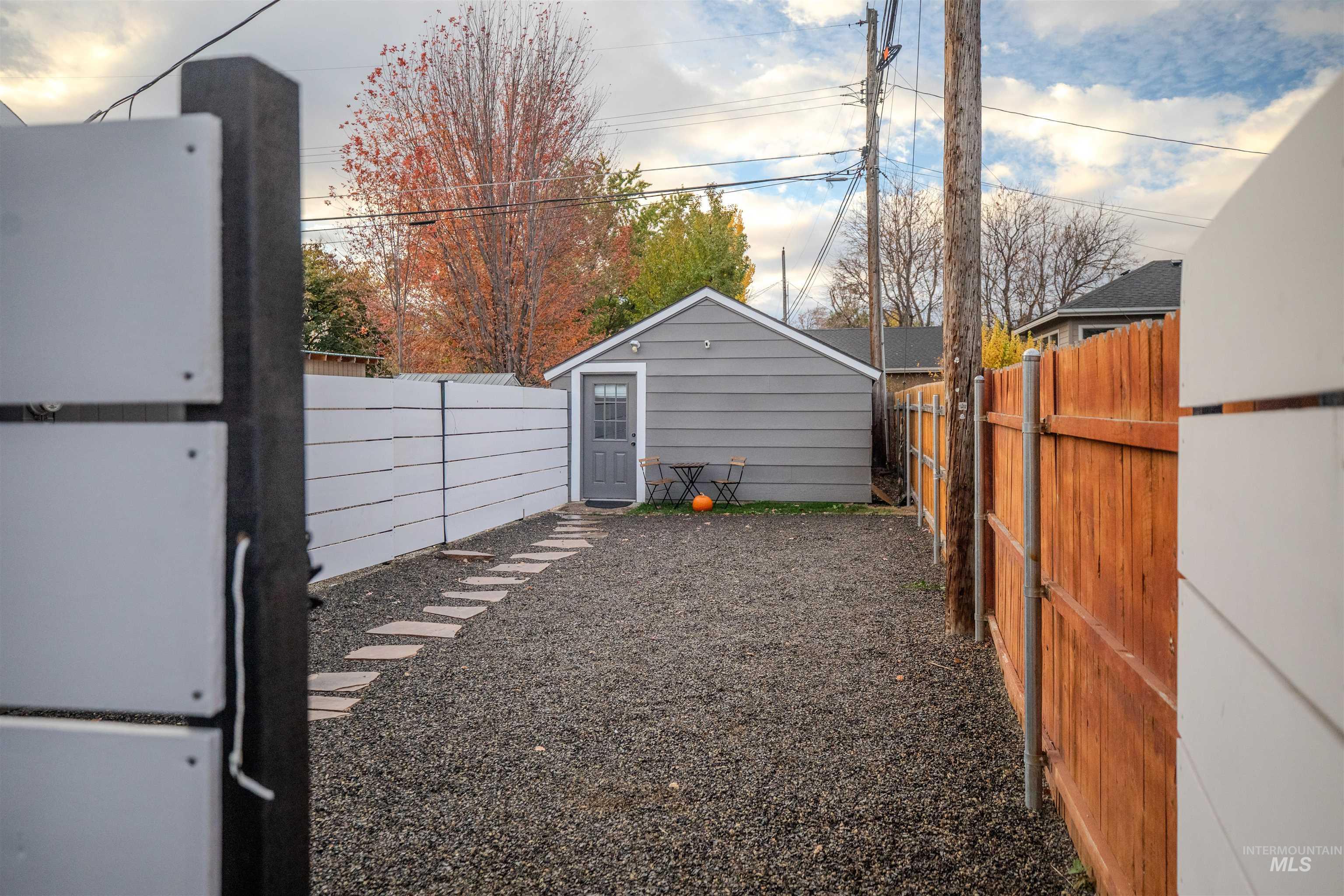 3311 West Hamilton Street Boise, ID 83705 - Photo 21 of 32 Fenced courtyard at the front of the detached studio unit.