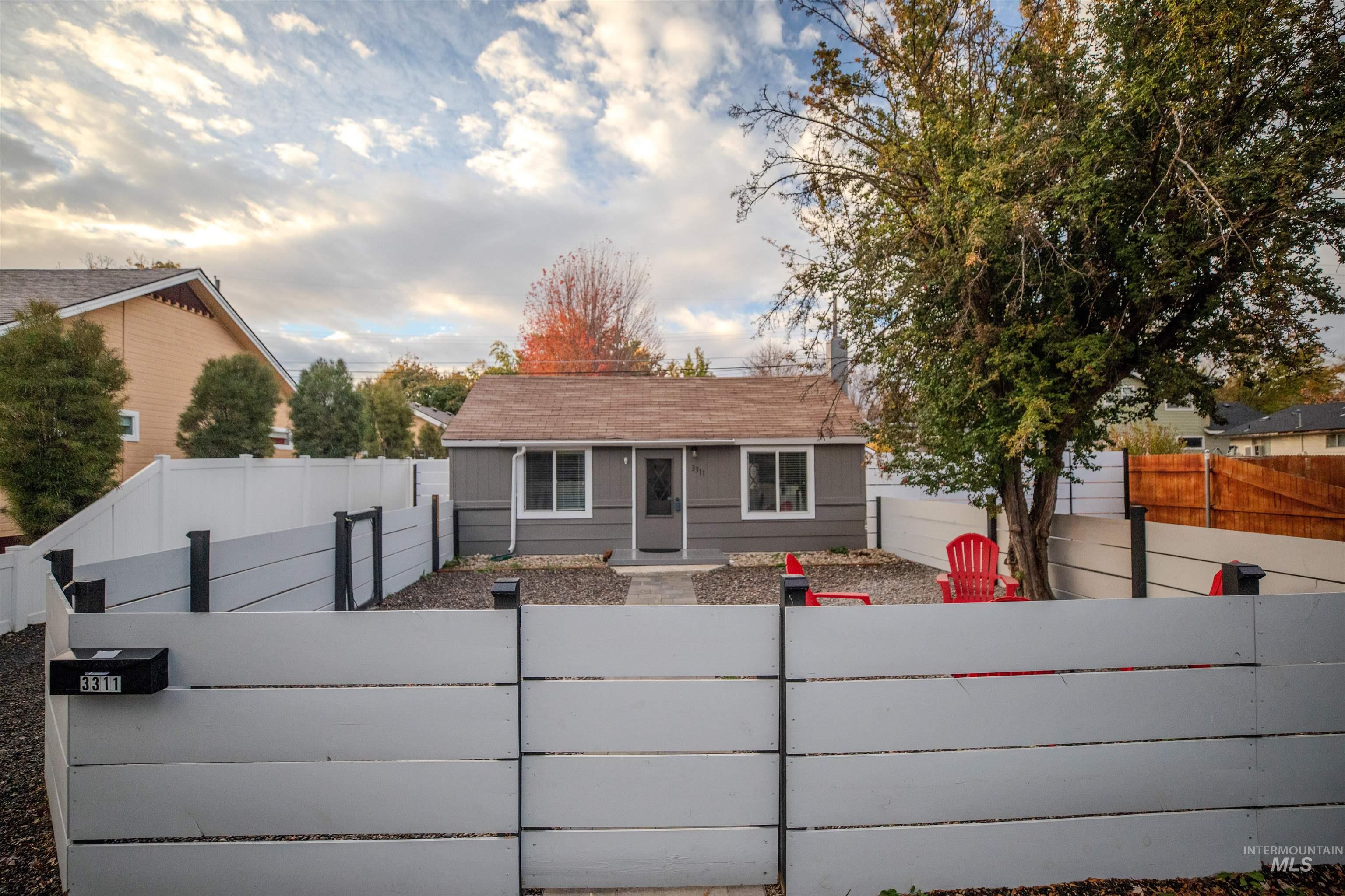3311 West Hamilton Street Boise, ID 83705 - Photo 3 of 32 View of front facade with gated and fenced yard