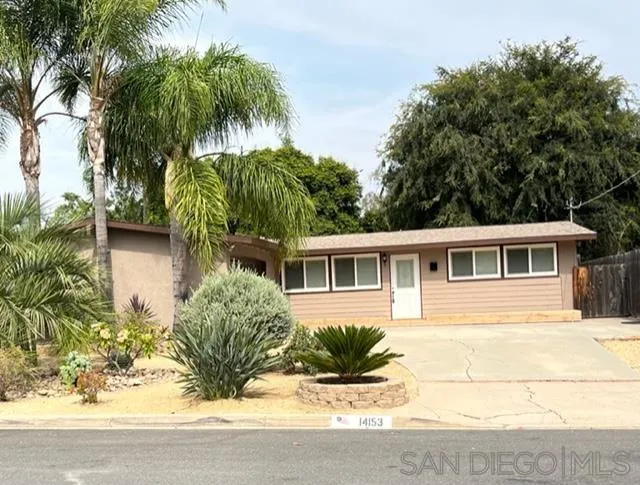 14153 Powers Road Poway, CA 92064 - Photo 1 of 12 front view of house with potted plants and palm trees