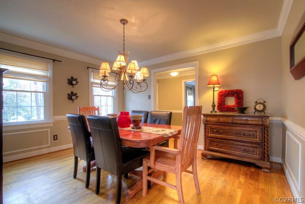 5701 Oak Knoll Road Midlothian, VA 23112 - Photo 8 of 36 a view of a dining room with furniture and window