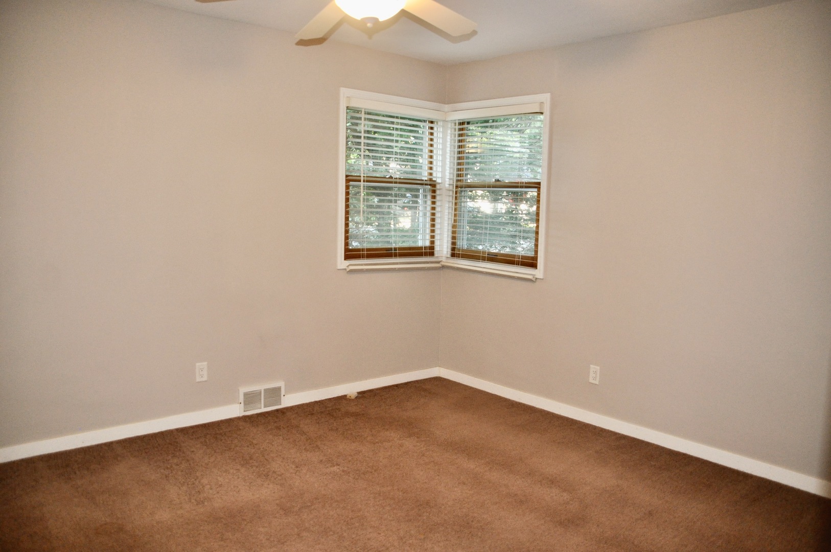 110 West 12th Avenue Naperville, IL 60563 - Photo 14 of 21 an empty room with a window