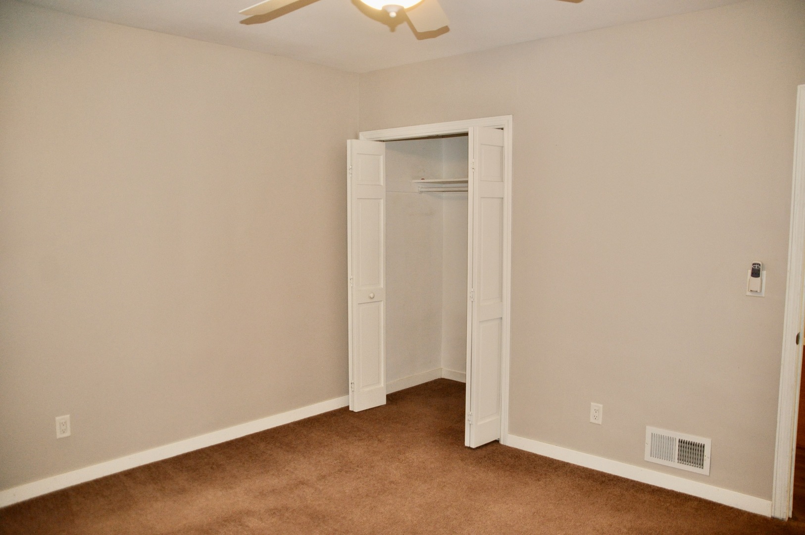 110 West 12th Avenue Naperville, IL 60563 - Photo 15 of 21 an empty room with a empty space and a window