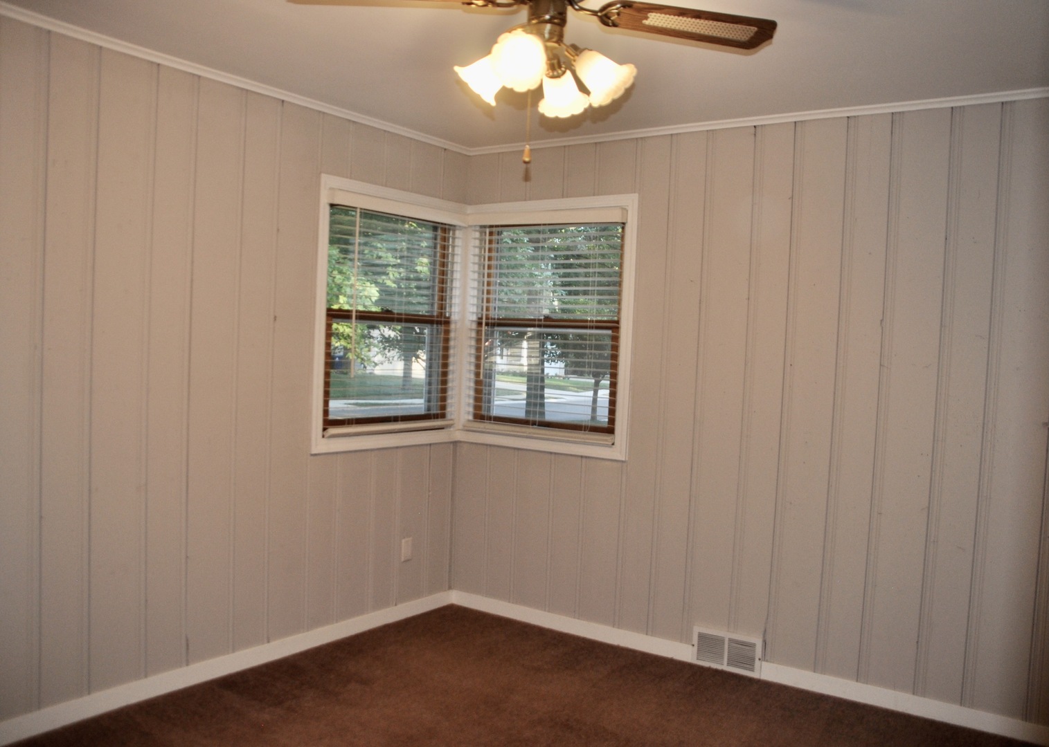 110 West 12th Avenue Naperville, IL 60563 - Photo 16 of 21 wooden floor in an empty room with a window