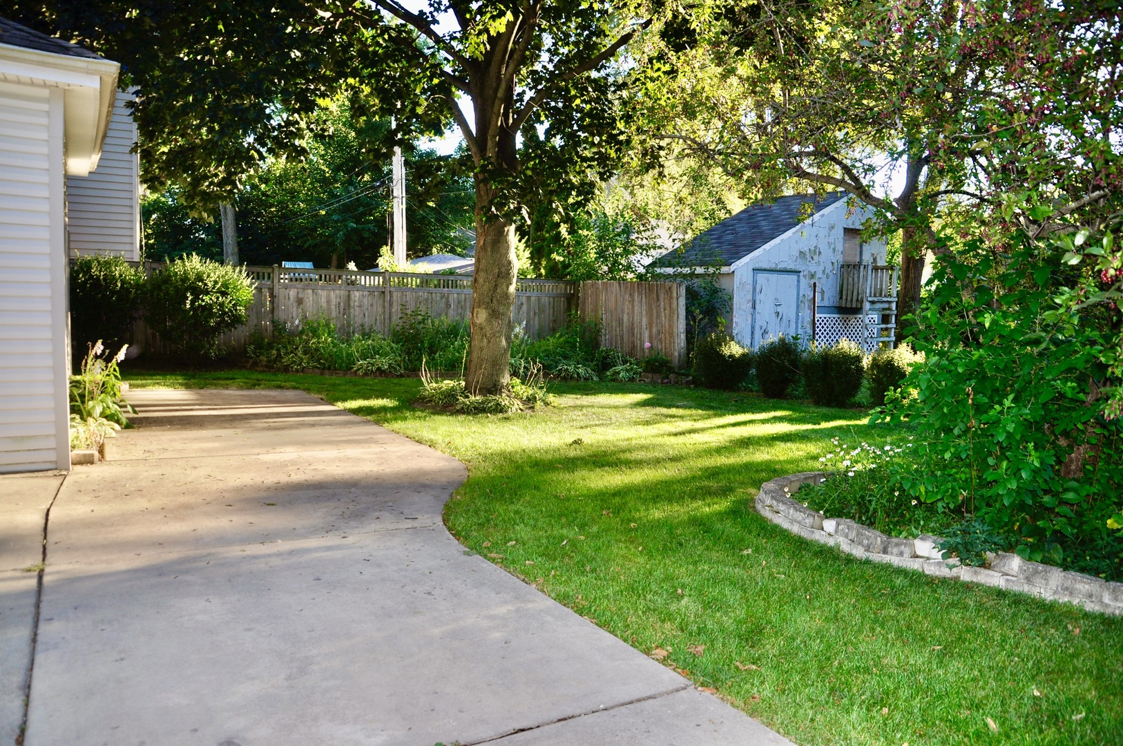 110 West 12th Avenue Naperville, IL 60563 - Photo 3 of 21 a view of a back yard of the house