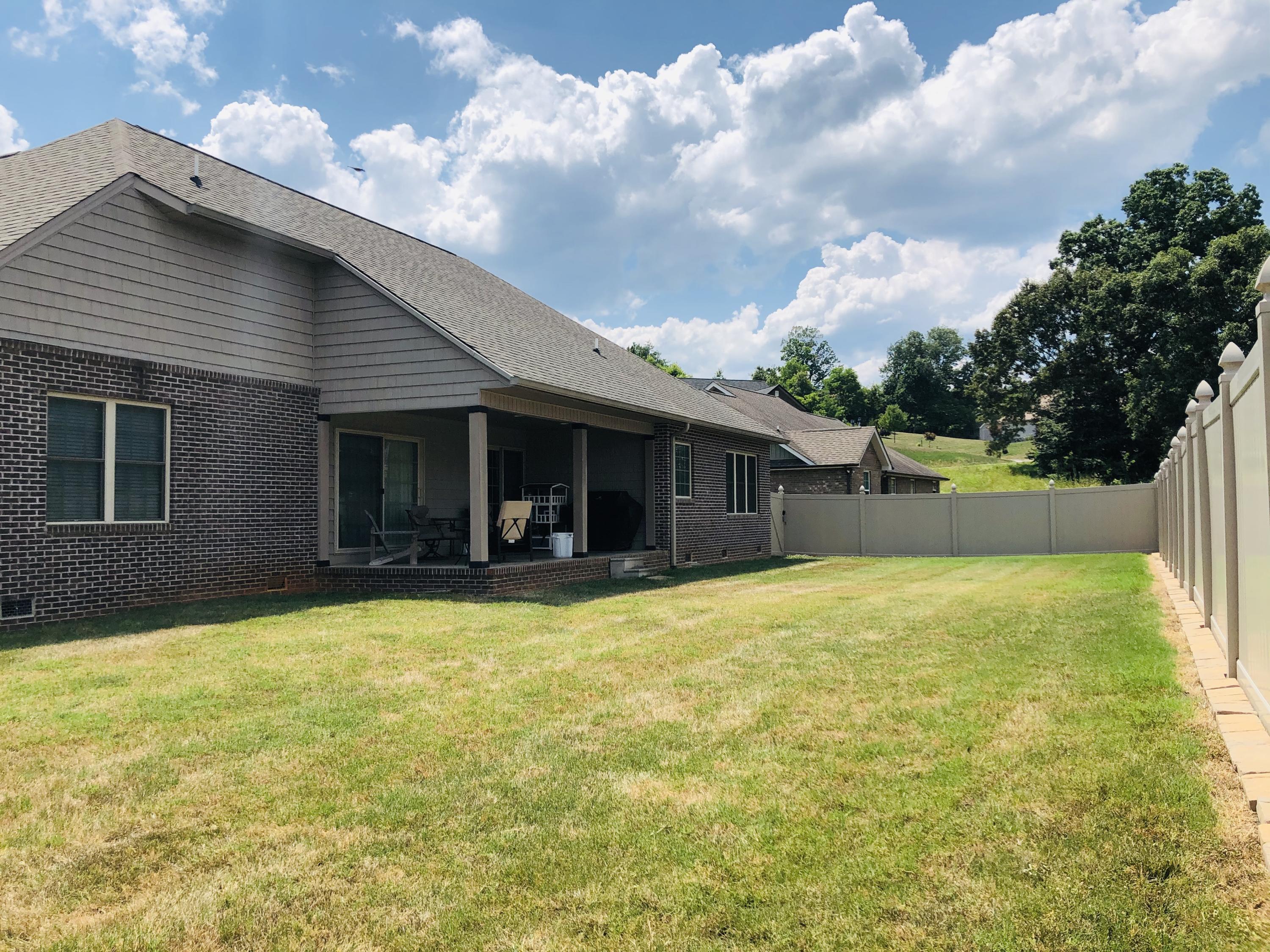 5910 Whisper Ridge Lane Corryton, TN 37721 - Photo 16 of 17 Backyard