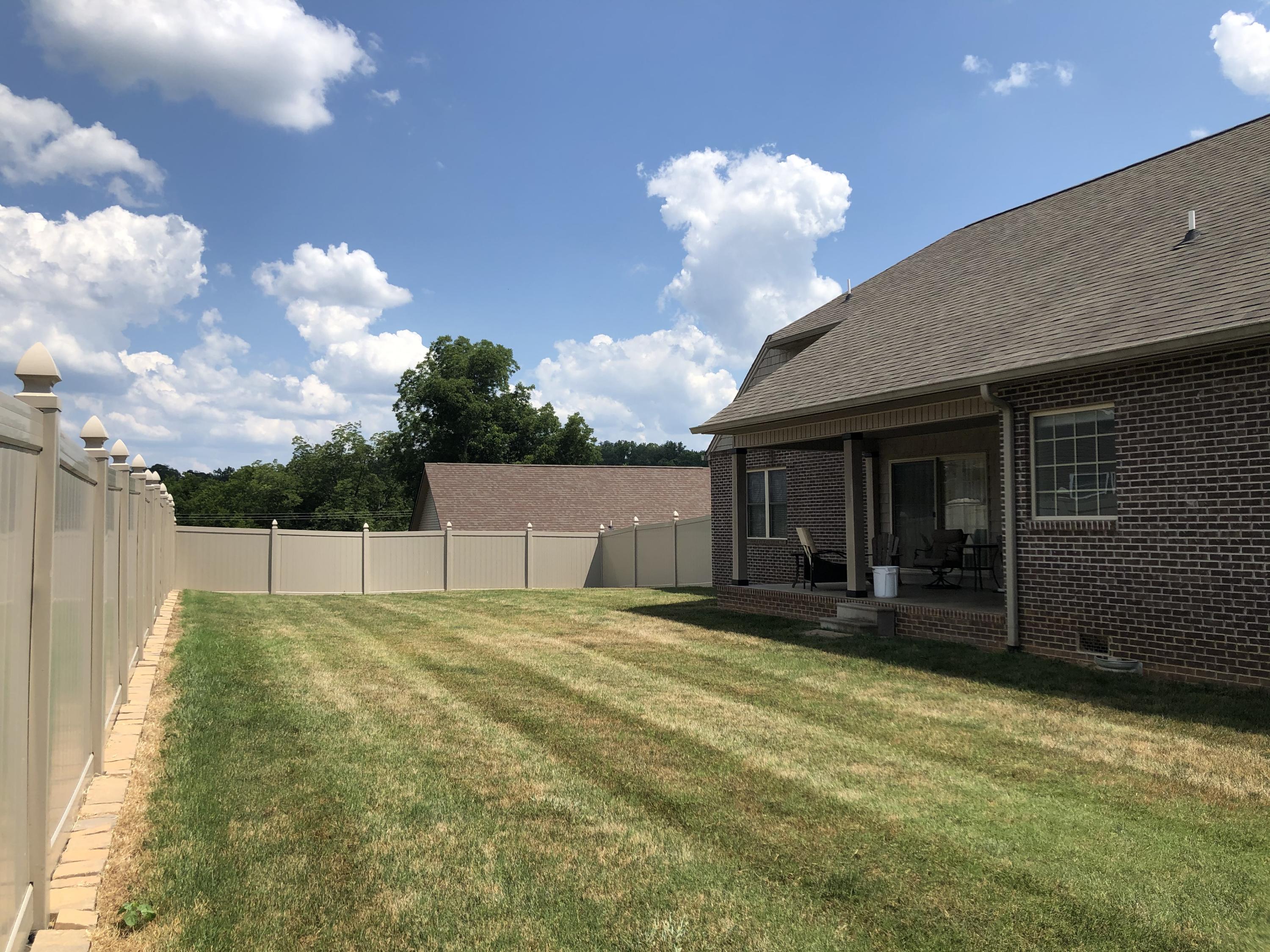 5910 Whisper Ridge Lane Corryton, TN 37721 - Photo 17 of 17 Backyard
