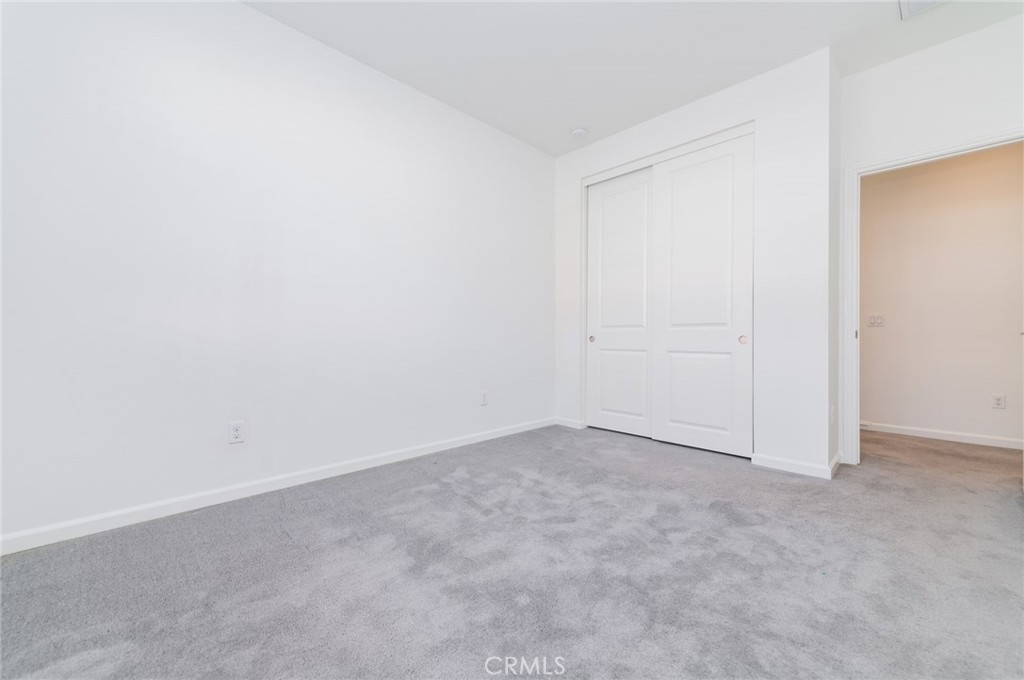 103 Tidal Irvine, CA 92620 - Photo 15 of 25 an empty room with an entryway