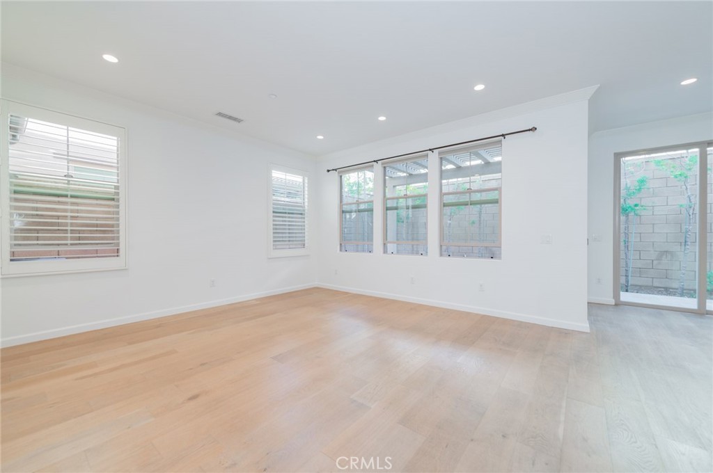 103 Tidal Irvine, CA 92620 - Photo 4 of 25 an empty room with windows