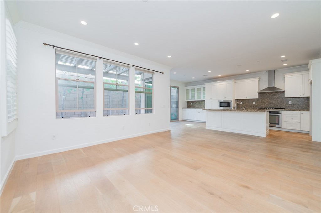 103 Tidal Irvine, CA 92620 - Photo 5 of 25 a view of large kitchen with large window and cabinets