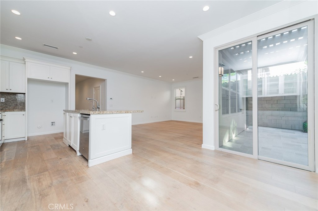 103 Tidal Irvine, CA 92620 - Photo 10 of 25 a view of a kitchen with a sink and cabinets