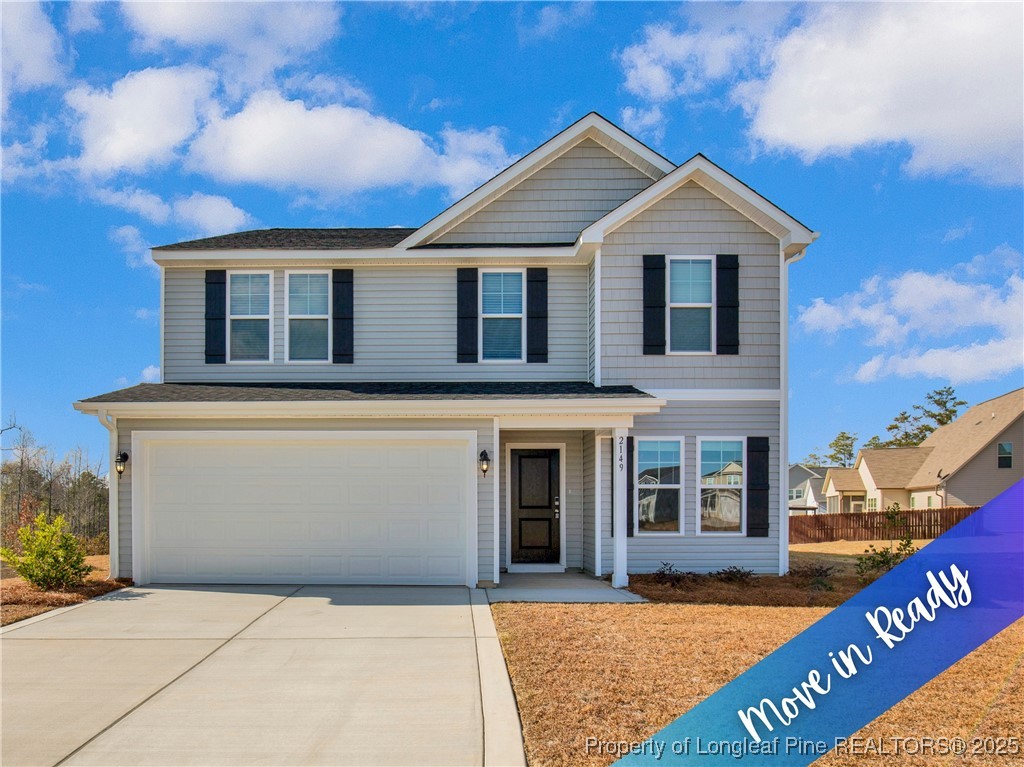 a front view of a house with yard