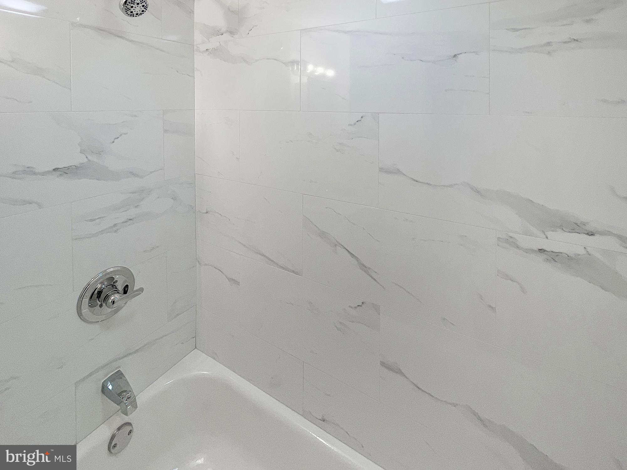 160 McClellan Street Philadelphia, PA 19148 - Photo 22 of 29 a bathroom with a bathtub