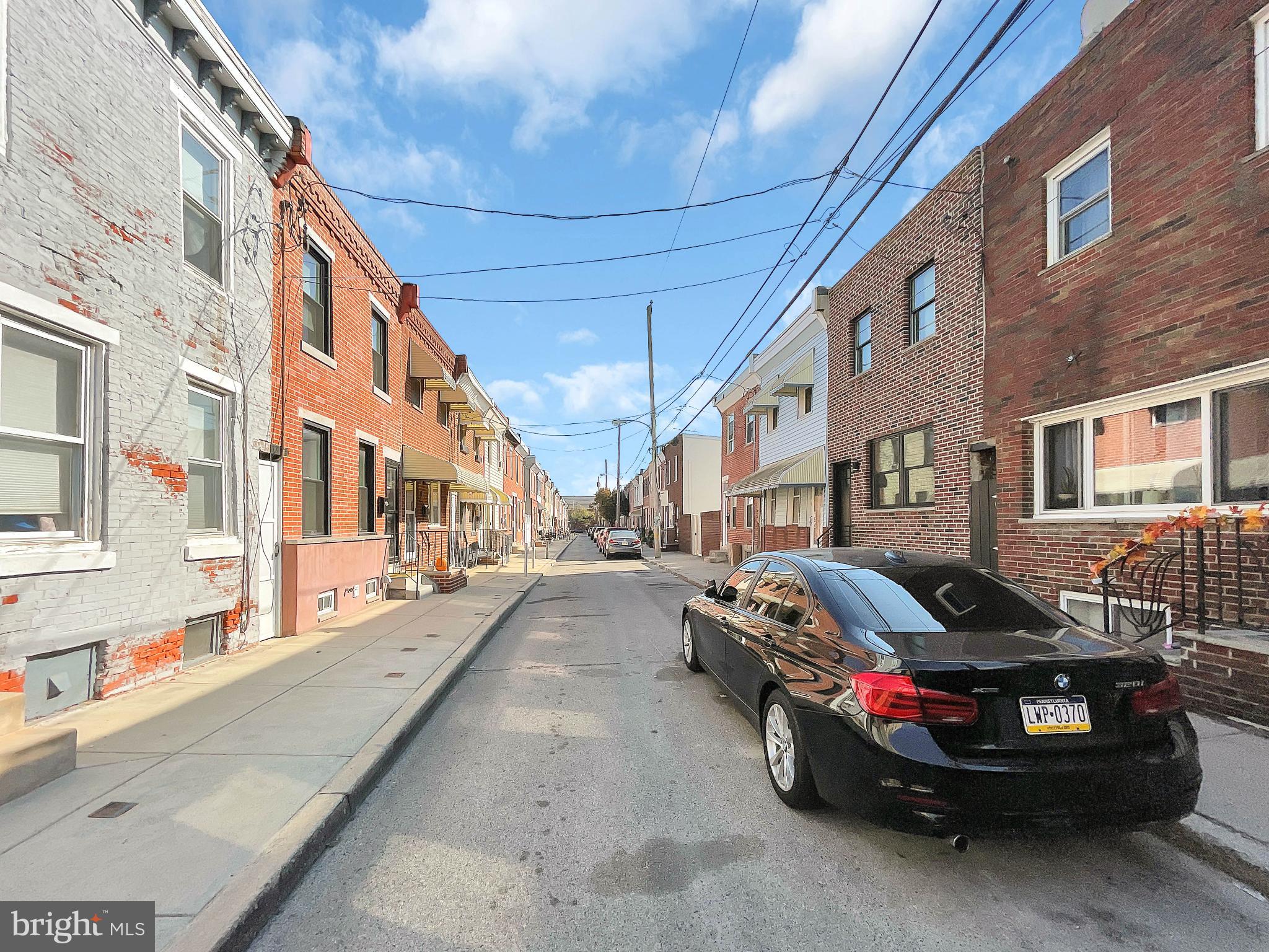 160 McClellan Street Philadelphia, PA 19148 - Photo 29 of 29 a car parked in front of brick building