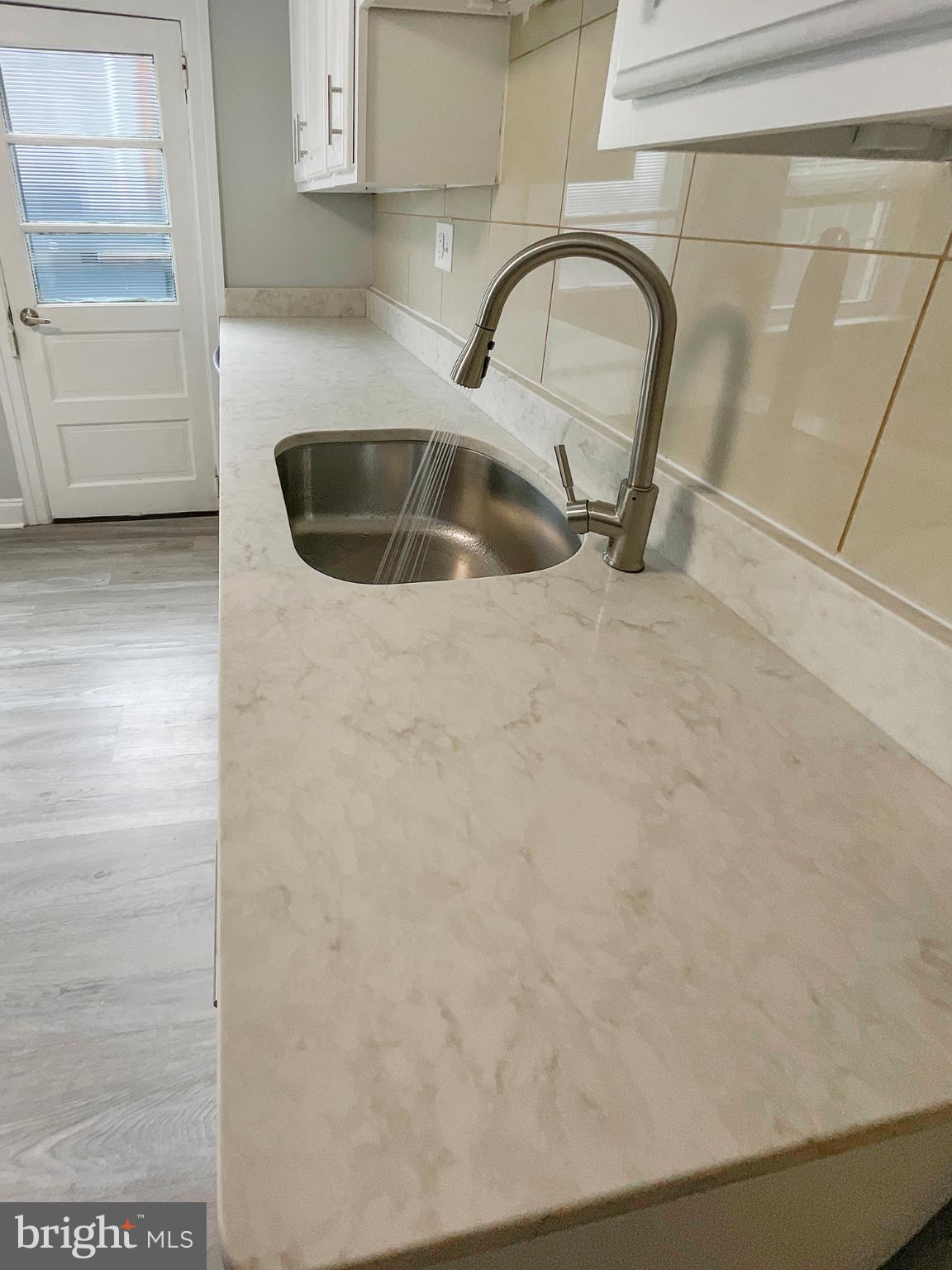 160 McClellan Street Philadelphia, PA 19148 - Photo 4 of 29 a close view of a sink and a roof