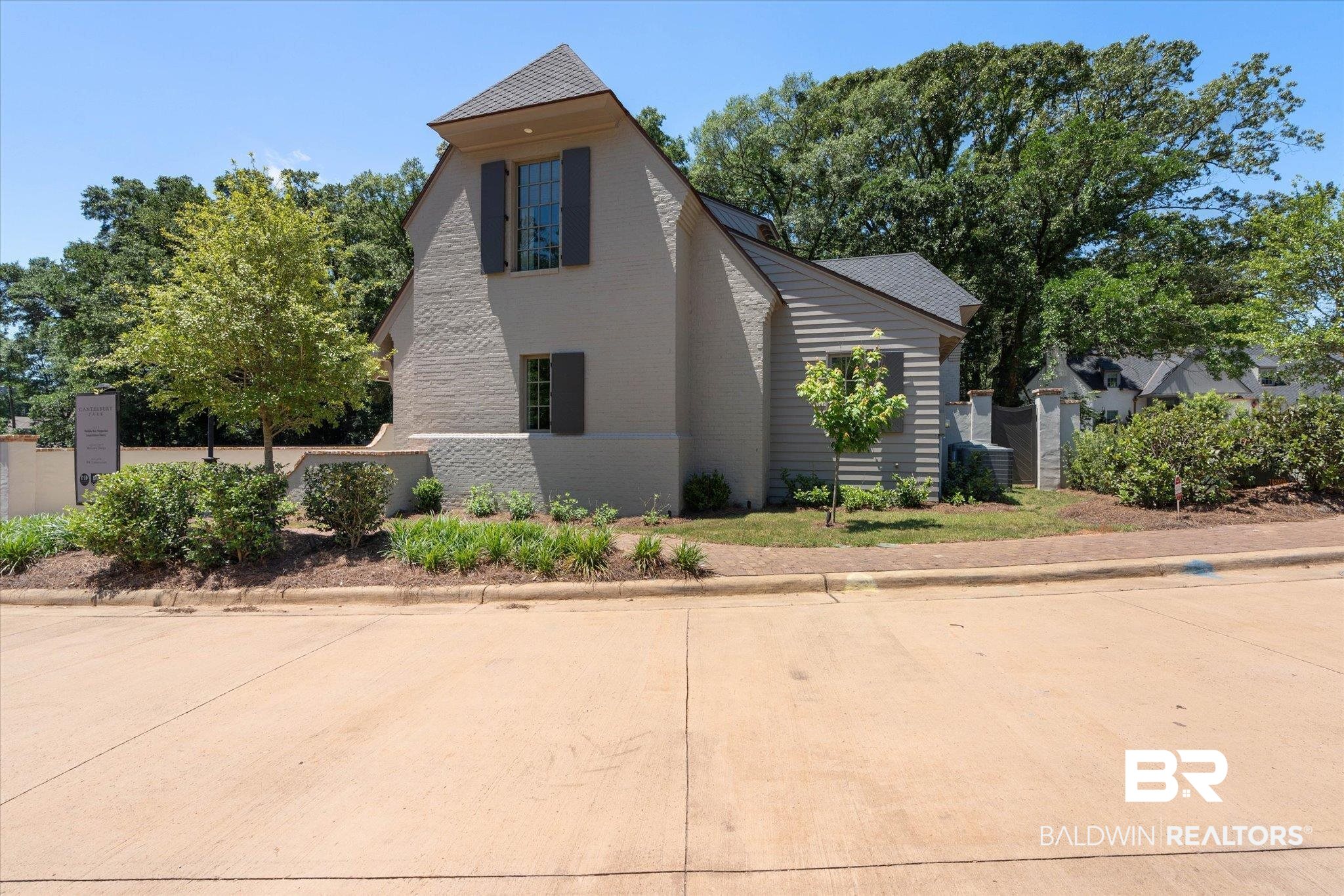 3 Canterbury Park Mobile, AL 36608 - Photo 37 of 43 View of property exterior with brick siding and fence