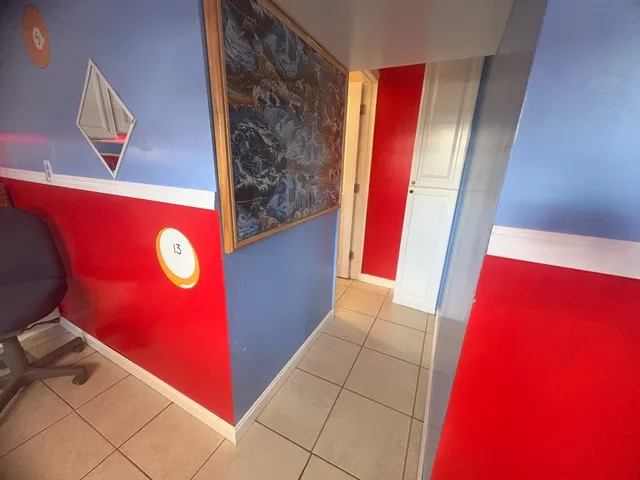 a bathroom with a sink a mirror and toilet