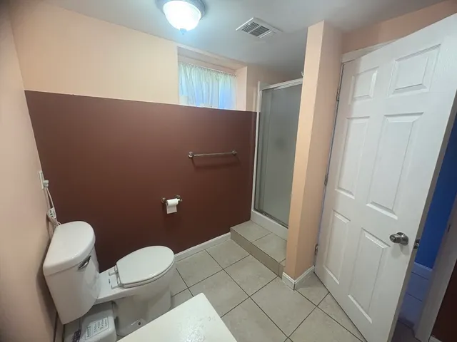 a kitchen view with a sink and cabinets