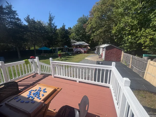 a view of backyard with seating space