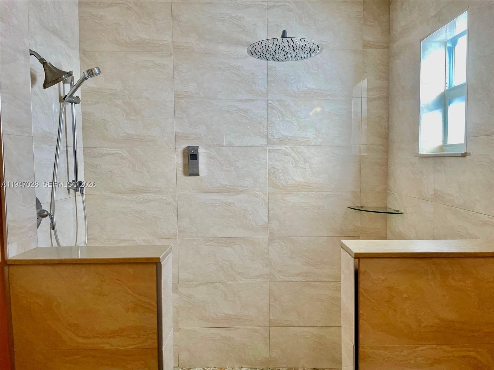 14503 Southwest 84th Street Miami, FL 33143 - Photo 15 of 23 a bathroom with a shower