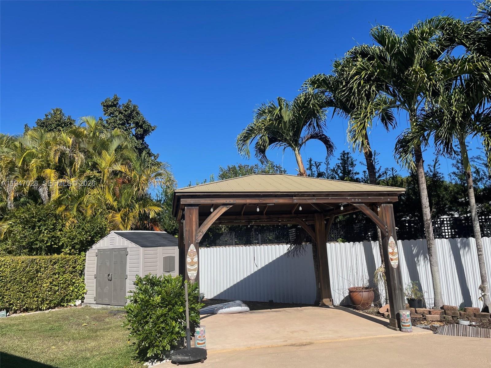 14503 Southwest 84th Street Miami, FL 33143 - Photo 6 of 23 a view of outdoor space and yard
