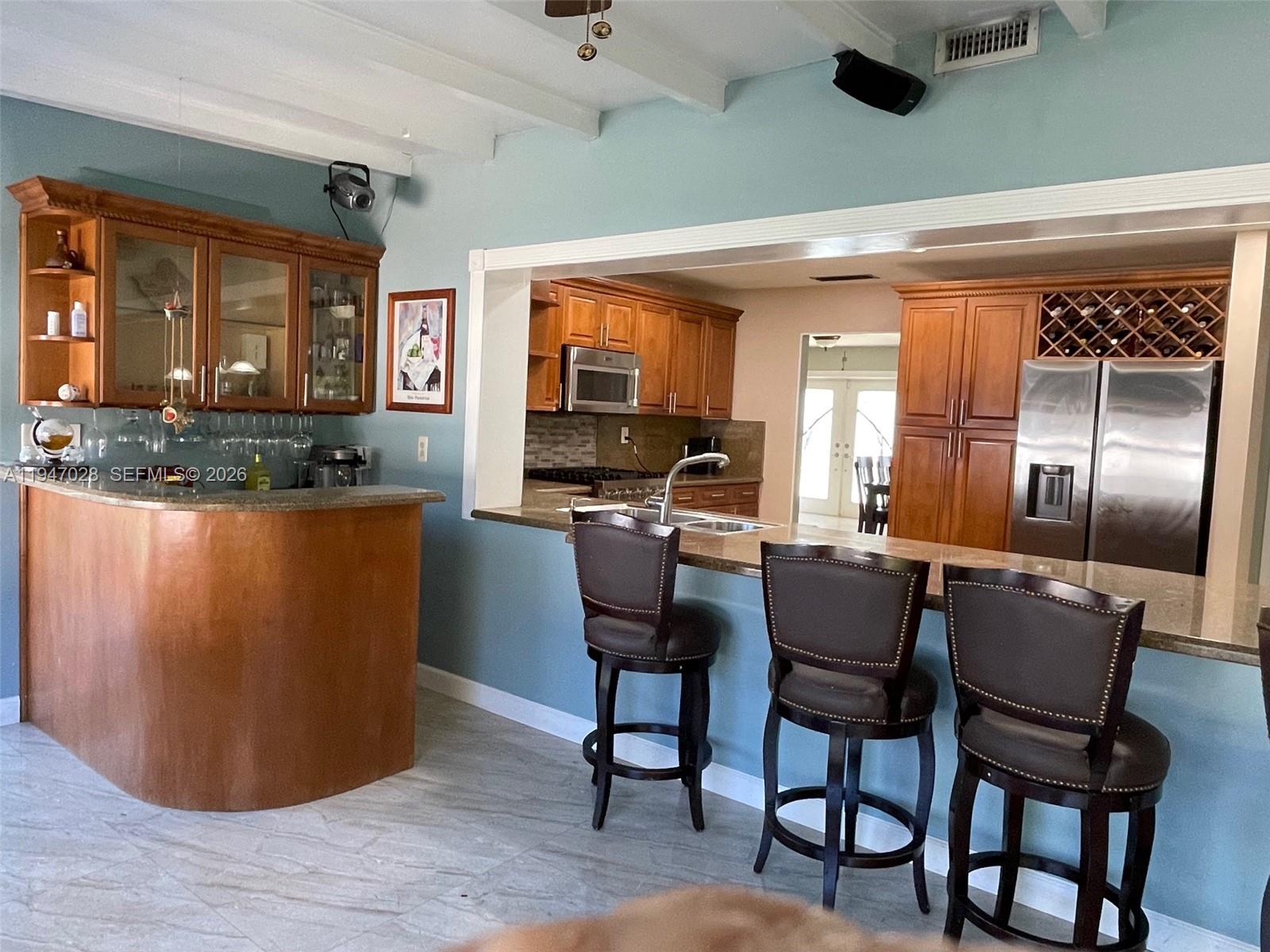14503 Southwest 84th Street Miami, FL 33143 - Photo 8 of 23 a view of a dining room with furniture window and outside view
