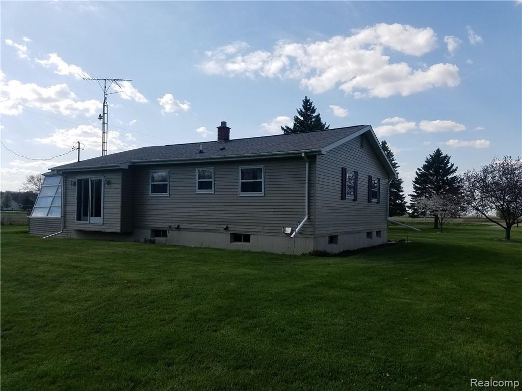8218 Shipman Road Corunna, MI 48817 - Photo 4 of 26 back side.jpg
