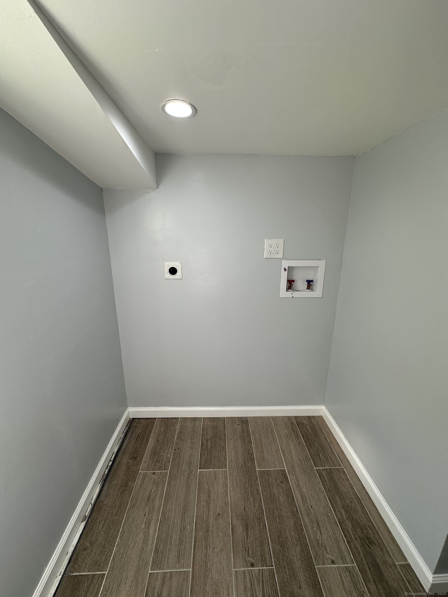 48 Prest Street New London, CT 06320 - Photo 21 of 27 a view of room with wooden floor