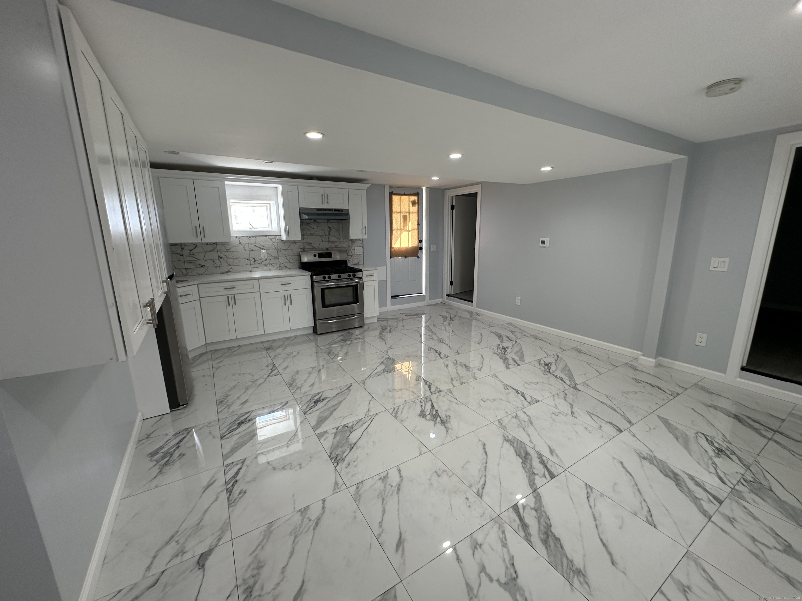 48 Prest Street New London, CT 06320 - Photo 26 of 27 a view of kitchen with furniture and refrigerator