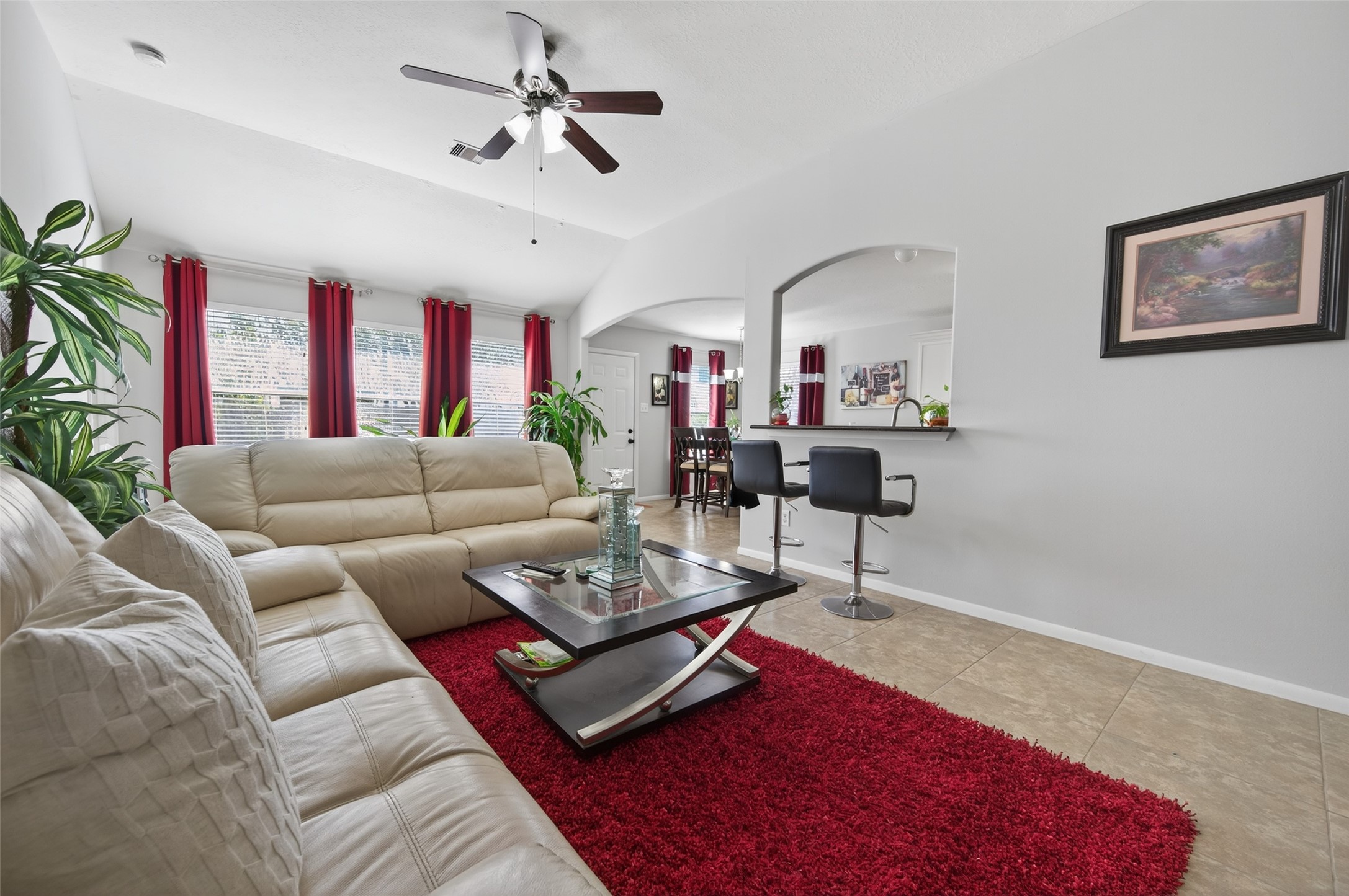 19655 Perth Meadows Court Katy, TX 77449 - Photo 14 of 44 a living room with furniture a rug and a window