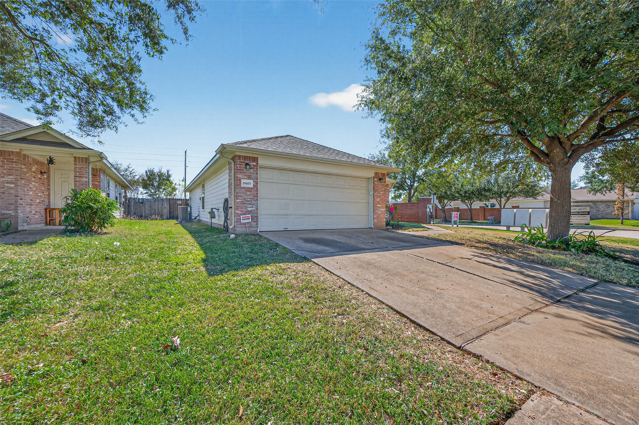 19655 Perth Meadows Court Katy, TX 77449 - Photo 2 of 44 a front view of a house with a yard and garage