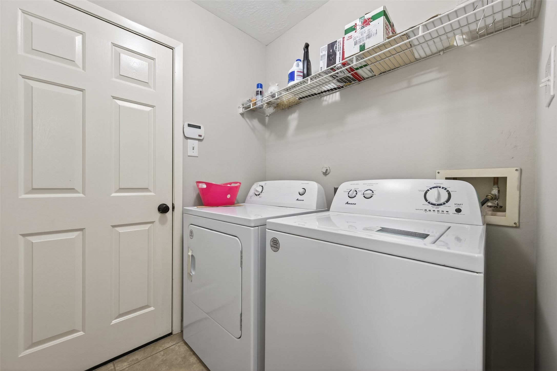 19655 Perth Meadows Court Katy, TX 77449 - Photo 29 of 44 a utility room with dryer and washer