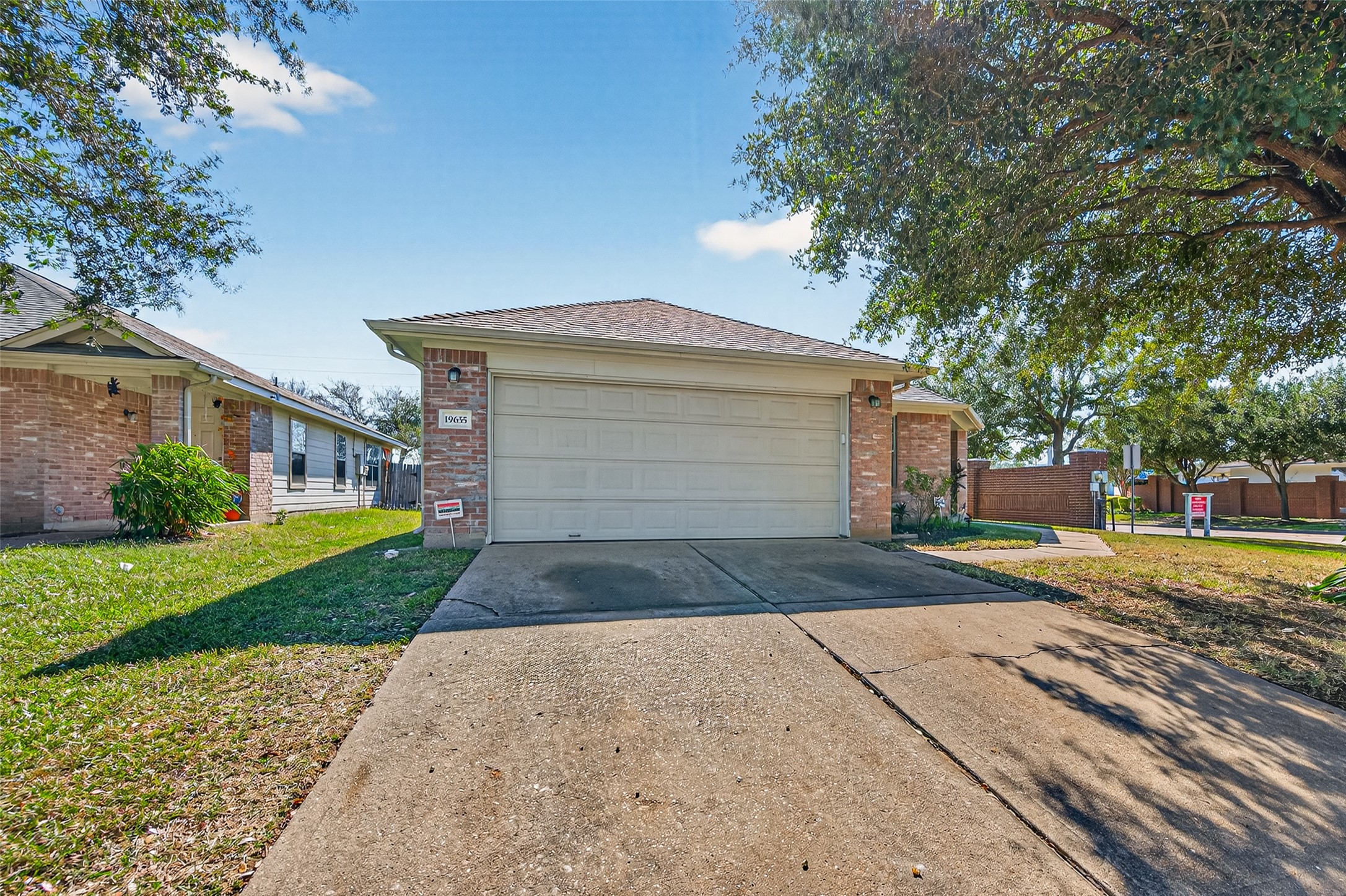 19655 Perth Meadows Court Katy, TX 77449 - Photo 3 of 44 a front view of a house with a yard and garage
