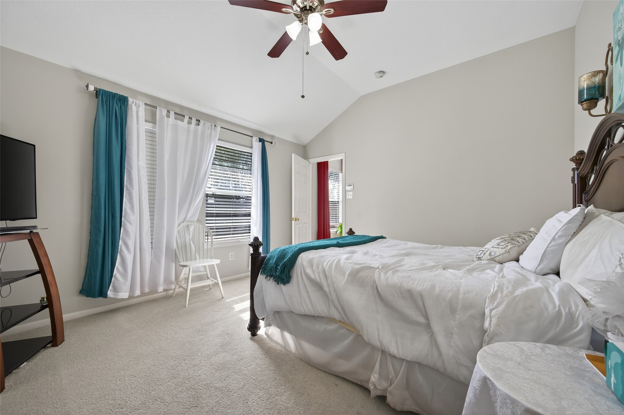 19655 Perth Meadows Court Katy, TX 77449 - Photo 34 of 44 a bed sitting in a bedroom next to a window