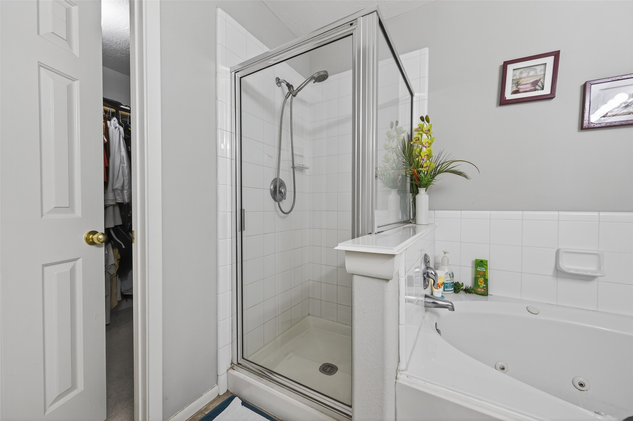19655 Perth Meadows Court Katy, TX 77449 - Photo 39 of 44 a bathroom with a bathtub and a shower