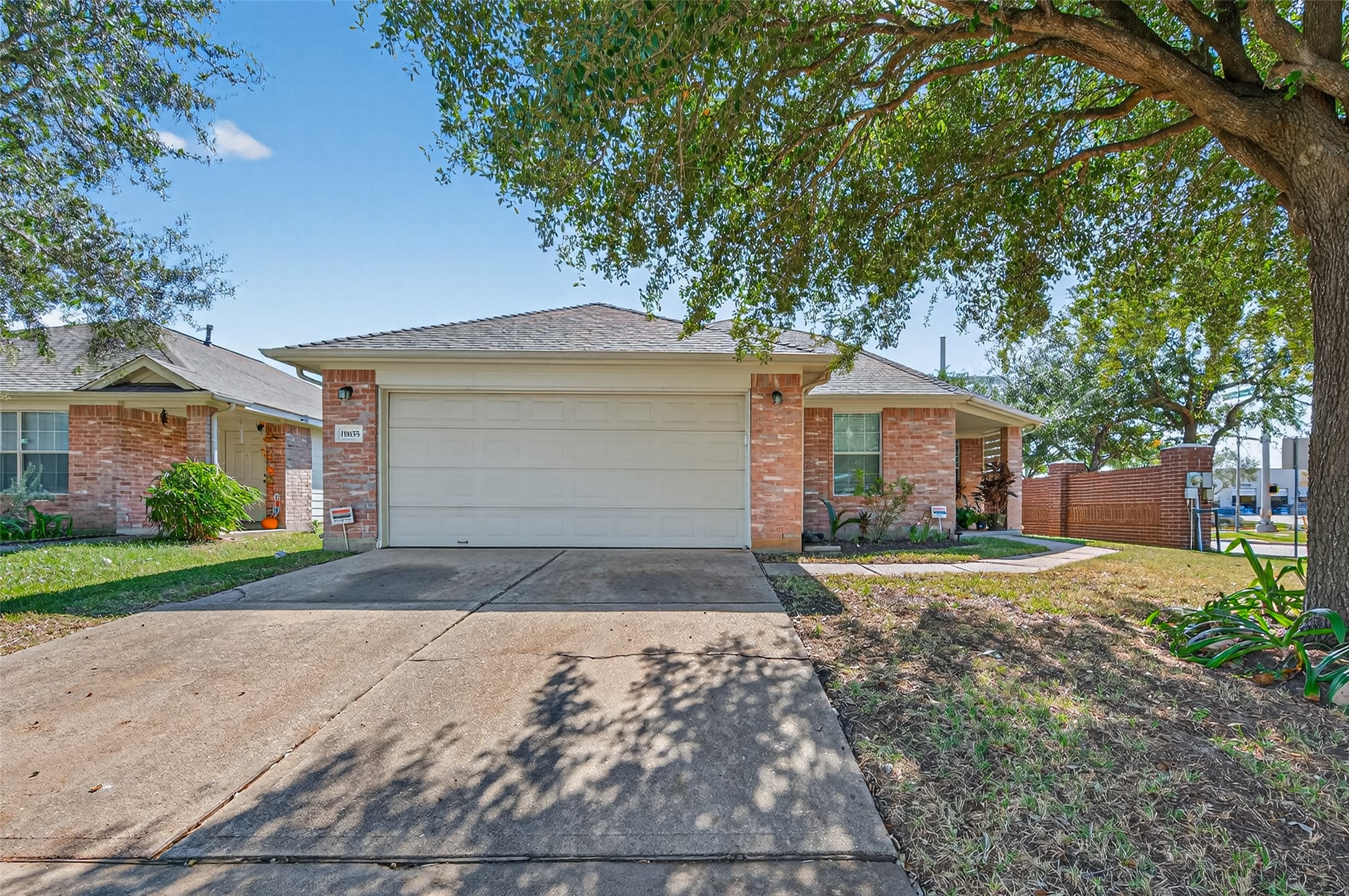 19655 Perth Meadows Court Katy, TX 77449 - Photo 4 of 44 a front view of a house with a yard and garage