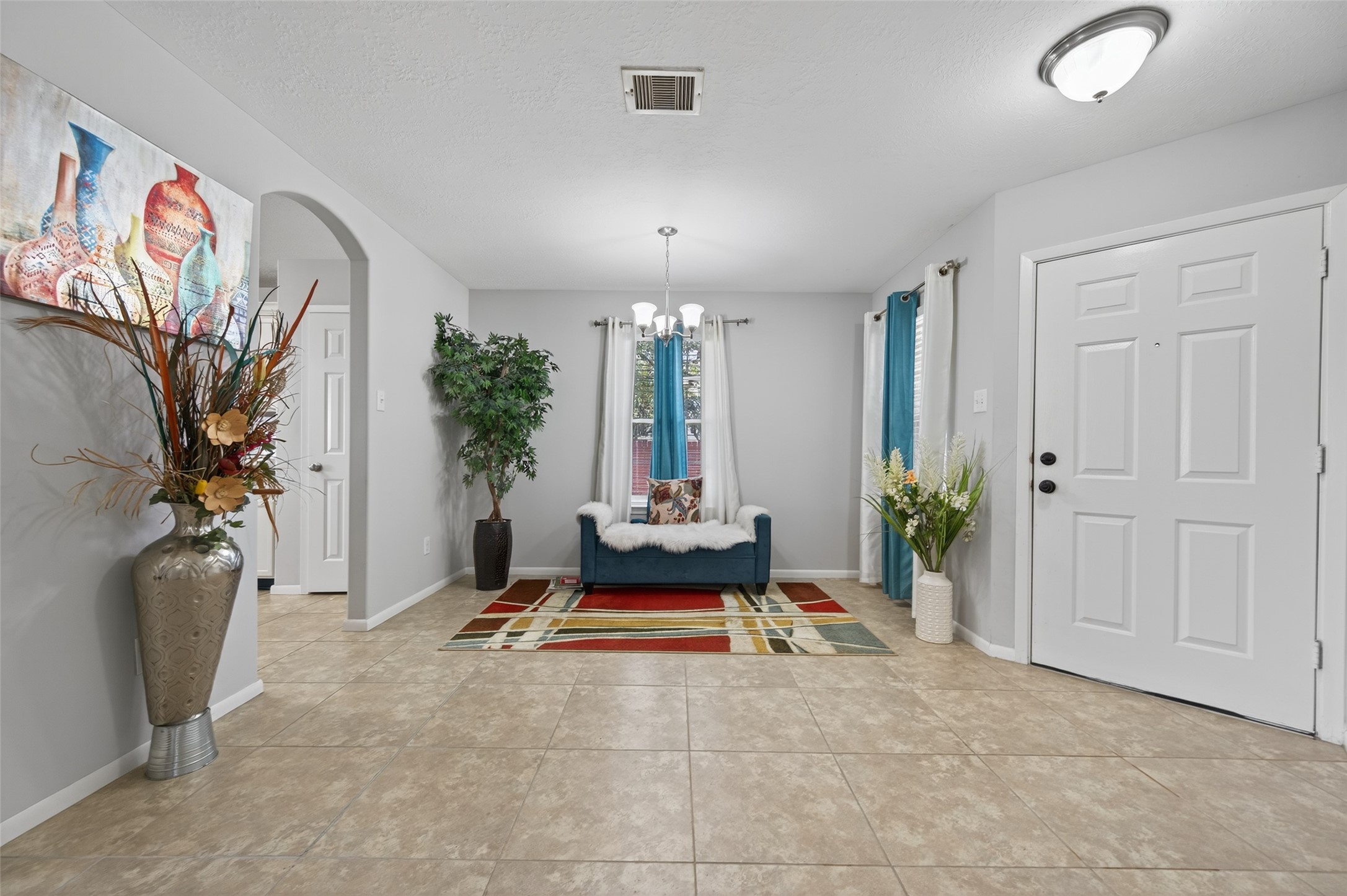 19655 Perth Meadows Court Katy, TX 77449 - Photo 9 of 44 a living room with furniture and a potted plant