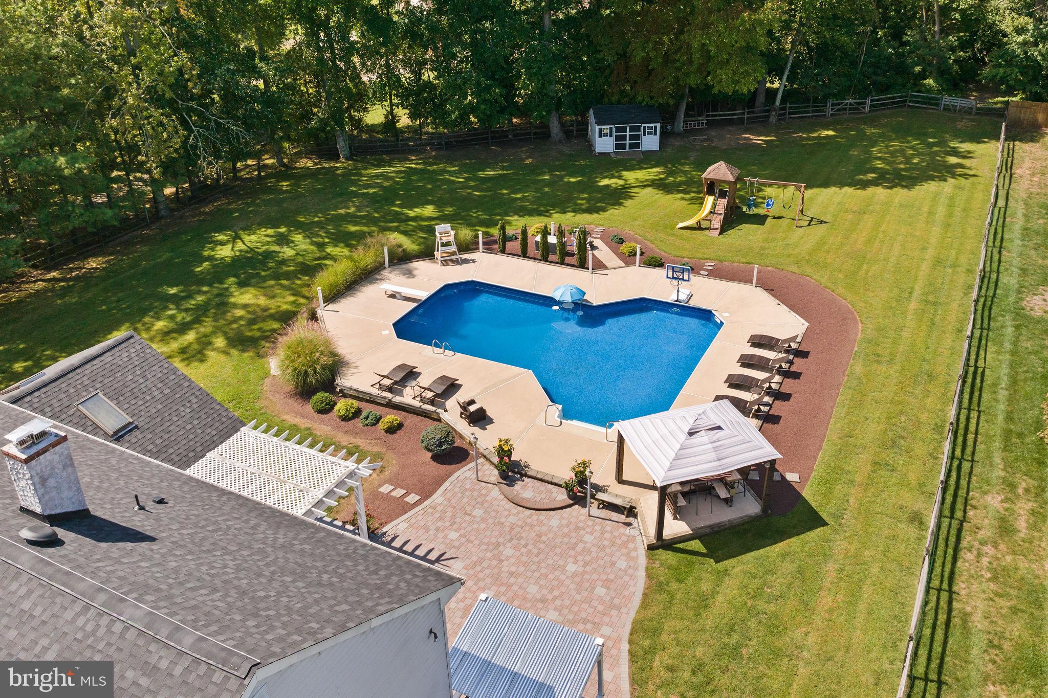 420 Extonville Road Allentown, NJ 08501 - Photo 16 of 57 an aerial view of a house with a lake view