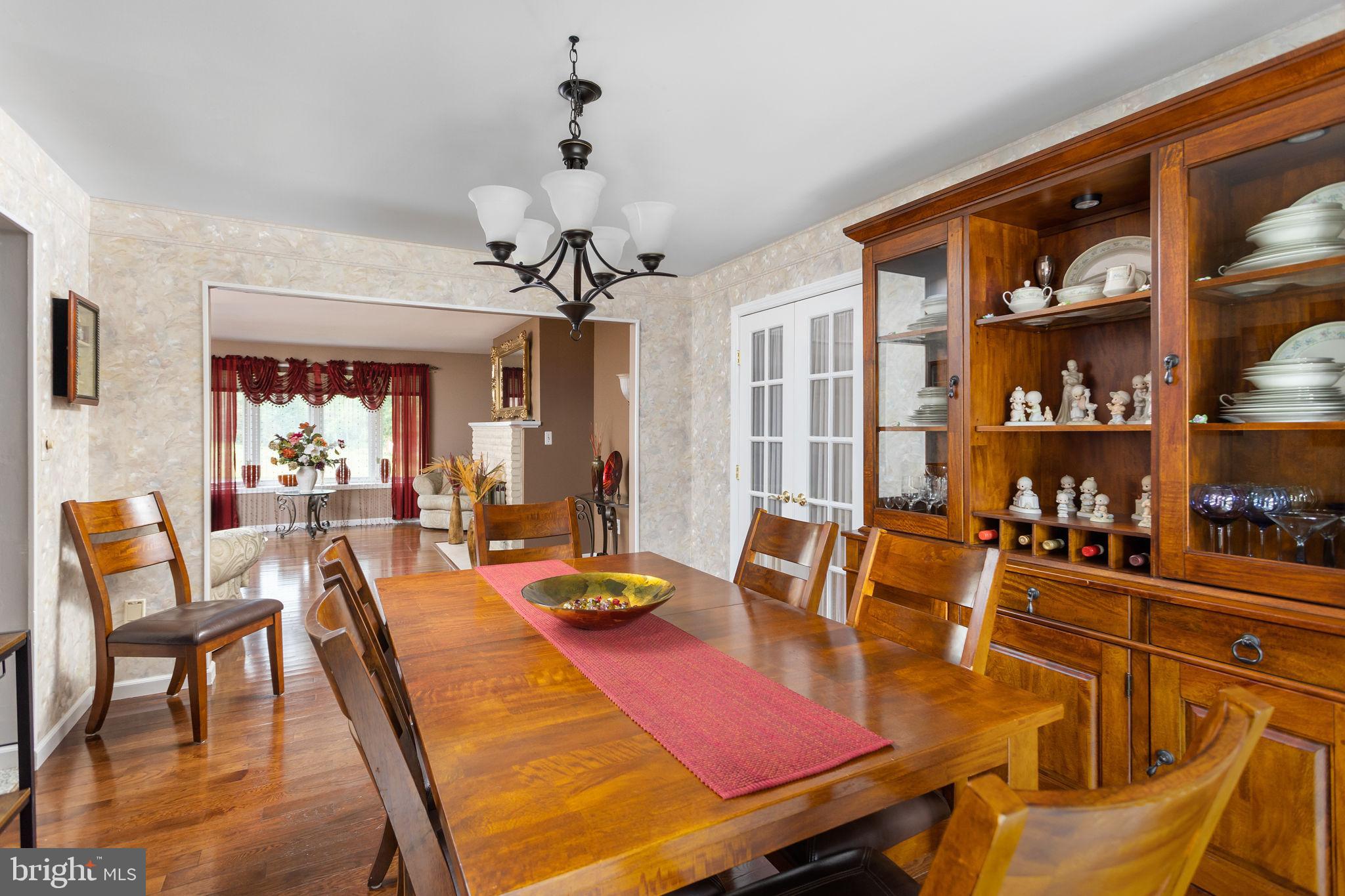 420 Extonville Road Allentown, NJ 08501 - Photo 28 of 57 a view of a dining room with furniture window and wooden floor
